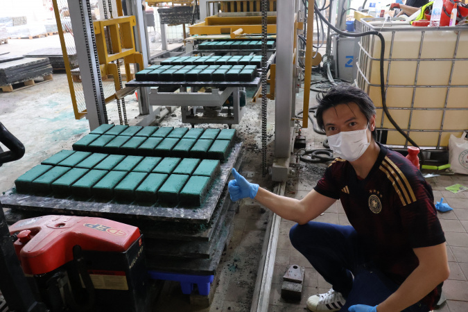 Prof. Tsang’s field-scale production of biochar-enhanced construction bricks: The image showcases the first field-scale production line in Hong Kong translating Prof. Tsang’s world-leading biochar research into practical construction technologies, developed in collaboration with the Hong Kong Environmental Protection Department.