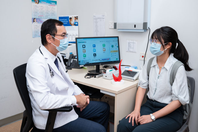 A six-month pilot study is currently underway at the HKUST Clinic, inviting all students, staff, and campus users to participate and provide feedback. Dr. Justin Cheng (left), who is also a registered medical practitioner at HKUST’s clinic. A photo of him demonstrating the usage of SmartCare system to streamline the clinical workflows.