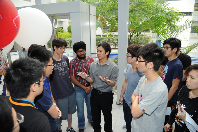 First-year engineering students sought advice from Prof. Ben Chan at the Engineering Team Design Experience course.