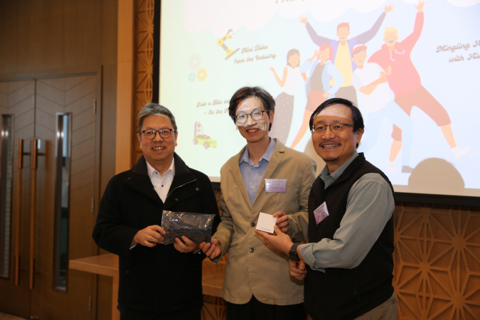 Mr. John Sze (center) received a souvenir from Prof. Hong K. Lo (left) and Prof. Chen Yong (right).