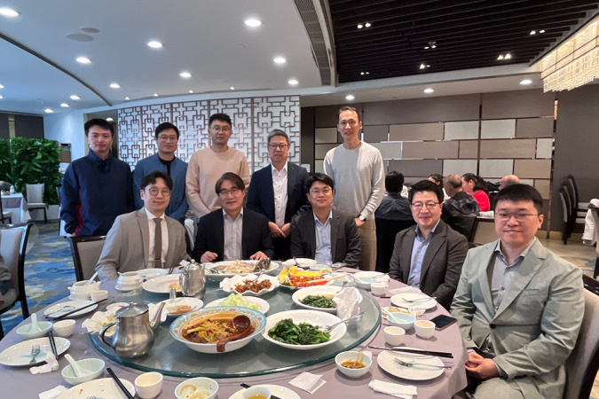 Prof. Hong K. Lo (second right, back row), HKUST Dean of Engineering, and faculty members from both departments during the lunch session.