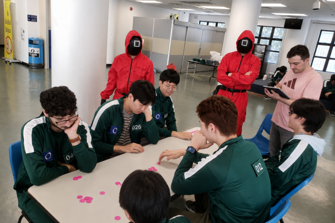 Students engaged in Nim, a classic mathematical strategy game featured in SquidMath, applying logical reasoning and strategic thinking to explore key ideas in discrete mathematics through hands-on, gamified learning.