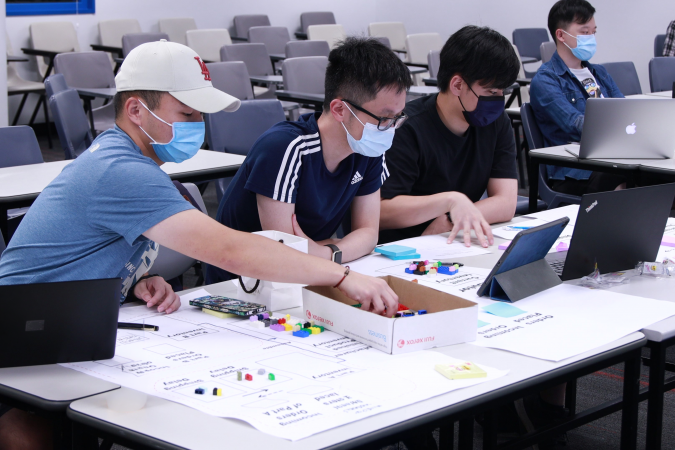 In a game-based activity in Prof. Qiu’s course, students used LEGO blocks to simulate an assembly process and test different layout design algorithms.