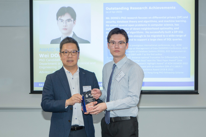 Dong Wei (right) received the School of Engineering PhD Research Excellence Award 2022-23 from Prof. Hong K. Lo, Dean of Engineering.
