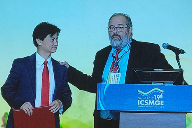 ISSMGE incoming President Prof Charles W W Ng (at the lectern) introduced the new board members and addressed the audience at the closing ceremony of the 19th International Conference on Soil Mechanics and Geotechnical Engineering.