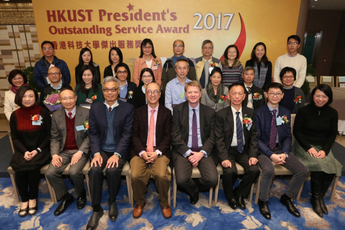 A group photo of the award winners with President Prof Tony F Chan (fourth from left, front row), Executive Vice-President and Provost Prof Wei Shyy (third from left, front row), Vice-President for Administration and Business and Chairman of the Selection Committee for the awards Mr Mark Hodgson (fourth from right, front row), and other senior staff members at the award presentation ceremony.