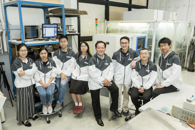 Prof. Ricky LEE (fourth from right) would like to thank all his group members over the years. Pictured are his current group members, including staff at the Center for Advanced Microsystems Packaging and his postgraduate students.