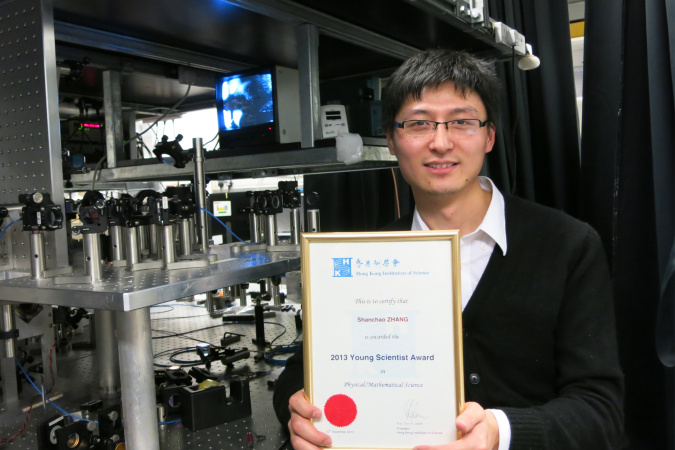 Zhang Shanchao with his award  