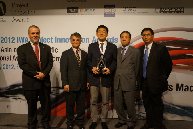 Prof Guanghao Chen (middle), together with representatives from Water Supplies Department and Drainage Services Department of the HKSAR Government, received the Honour Award of Project Innovation Awards (PIA) in the East Asia Region by the International Water Association (IWA) at the Singapore International Water Week on 3 July, 2012
