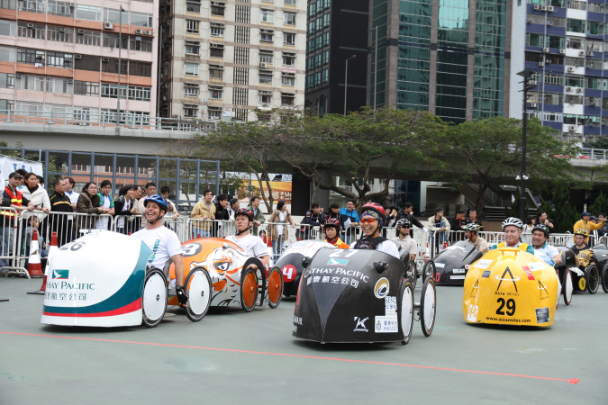  The race was going to begin: Pedal karts were positioned awaiting the starter’s gun.  
