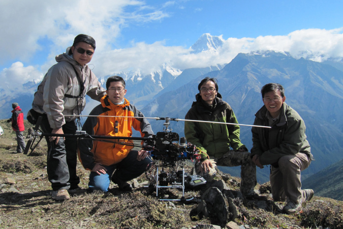 The core team for the test flight: (from right) Prof Zexiang Li, Frank Wang, Jianyu Song and a technician.