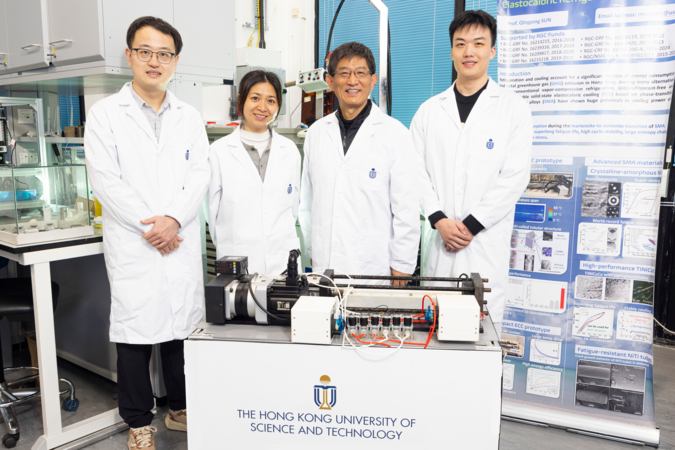 Prof. Sun Qingping (second right) and Prof. Yao Shuhuai (second left), both Professors of the Department of Mechanical and Aerospace Engineering (MAE), MAE Postdoctoral Research Associate Dr. Zhou Guoan (first left), and MAE PhD student Li Zexi (first right) with the world’s first kilowatt-scale elastocaloric green cooling device they develop.