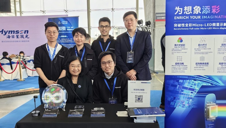 Electronic and Computer Engineering alumni Dr. Eddie Chong Wing-Cheung (front row, right) and Dr. Zhang Xu (back row, second right), both from Raysolve Technology, and their former PhD supervisor Prof. Kei May Lau (front row, left), together with other members of the company