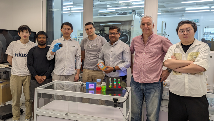 Dr. Kang Chengbin (3rd left) is holding a white LED and Prof. Abhishek Srivastava (3rd right) with a set of QRLED prototypes in his hand and various monochromatic quantum rods on the table. Other co-authors are Liao Zebing (1st left), Kumar Mallem (2nd left), Dr. Maksym Prodanov (center), Dr. Valerii Vashchenko (2nd right) and Song Jianxin (1st right).