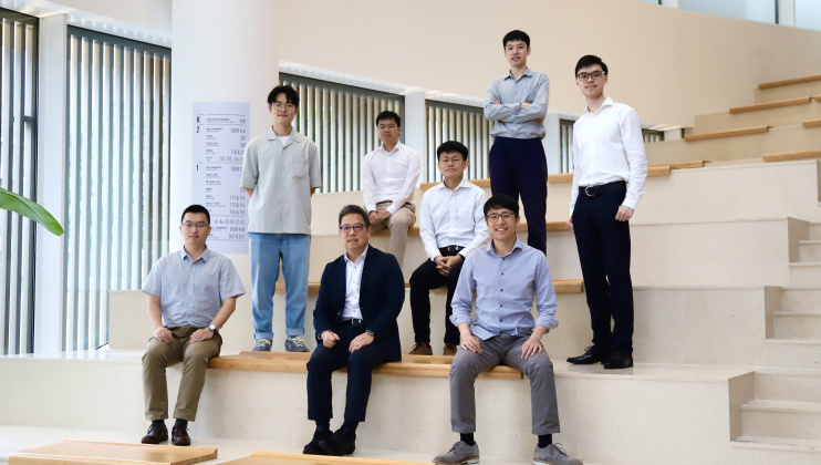 Dean of Engineering Prof. Hong K. Lo (front row, center) and his research team members