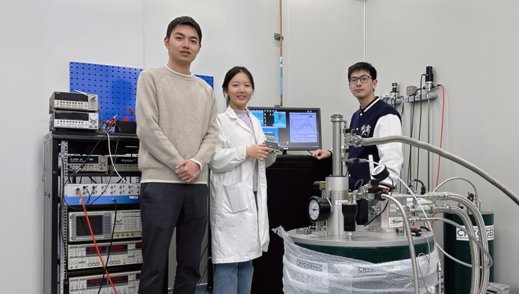 A photo of authors with a cryogenic system: Prof. Shao Qiming (right), PhD students Qian Kun (center) and Liu Ruizi (left) from the Department of Electronic and Computer Engineering.